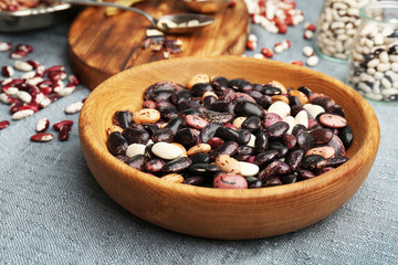 Closeup of bowl with haricot beans on table