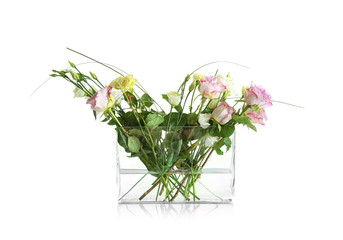 Vase with bouquet of beautiful flowers on white background
