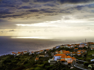 Light mood above the ocean, village, Portugal, Madeira, South Co