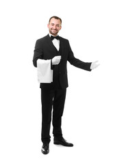 Handsome waiter with towel on white background