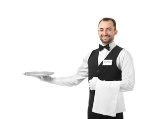 Handsome waiter with metal tray on white background
