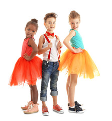 Cute little dancers on white background