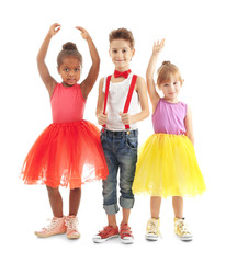 Cute little dancers on white background