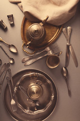 Set of vintage dinnerware on gray table