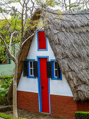 Fototapeta na wymiar Botanical garden, Casas de Colmo, traditional house with thatche