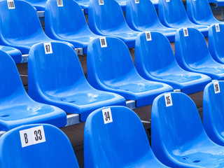 Blue plastic chairs on a tribun, Portugal, Madeira, Funchal