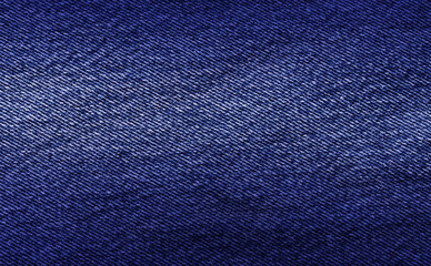 Jeans background.Denim jeans fabric texture background  with copy space for text or image. Dark edged.Jeans pattern