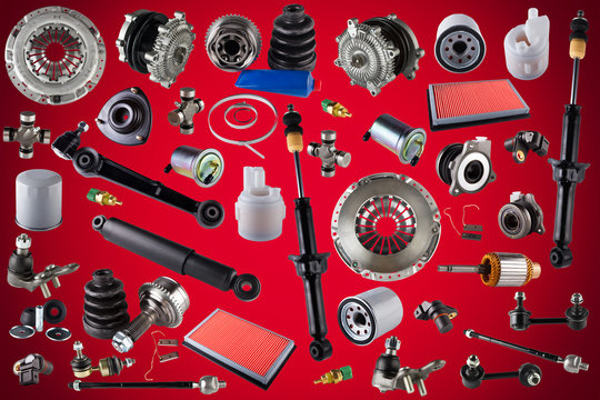 Spare auto parts car on the red background. Set with many isolated items for shop or aftermarket