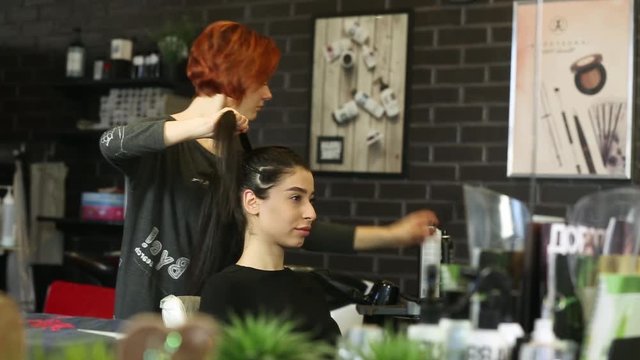 Professional Salon Hairstyle On The Girl's Head