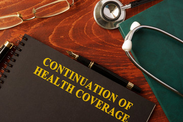 Book with title Continuation of Health Coverage. 