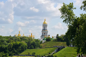 Fototapeta na wymiar Kyiv. Ukraine. The Park of Eternal Glory to the Soldiers of the World War II. Kyiv Pechersk Lavra (monastery) is in the background.