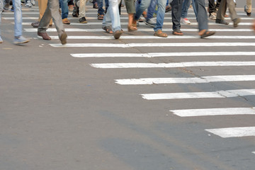 Pedestrian are crossing in zebra crossing