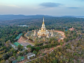 Aerial view landmark : " Pra Maha Chedi Chai Mongkhol Temple " at sunset sky.
beautiful public landmark of Roi-Et Province, Thailand. 