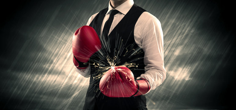 Boxing gloves clashing