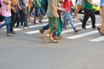 Pedestrian are crossing in zebra crossing