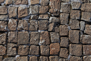 Stone blocks covered with snow