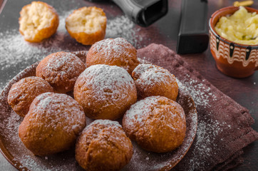 Homemade donuts with sugar and gun