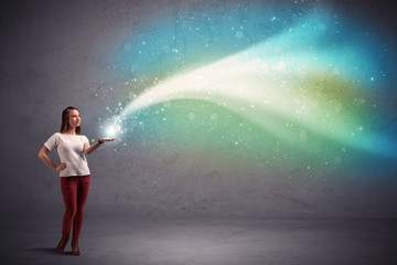 Fototapeta premium Woman holding light