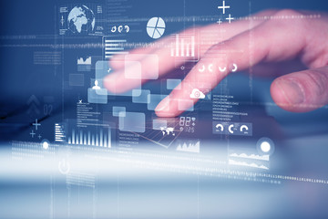 Keyboard buttons pressed by hand with high tech icons