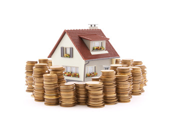 House with stack of coins