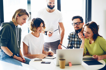 Group of project managers are brainstorming at the modern coworking space. Digital marketing...