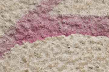 painted street wall in white and pink