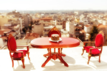 miniature classical dining on a marble floor