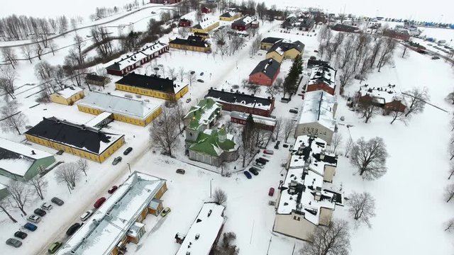 Wooden houses, church and museums of fortress of Lappeenranta (Lappeenrannan linnoitus) on Kristiinankatu street at winter season. Aerial view. Lappeenranta, Finland