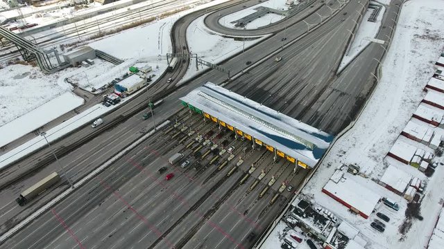 Junctions and toll barrier of the Western High-Speed Diameter in Kubinskaya street at winter season. South part of city of St. Petersburg, Russia 