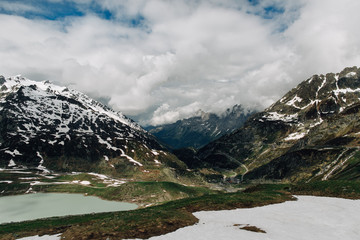 Landscape of Alps mountains in cloudy weather