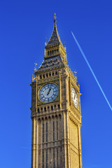 Fototapeta na wymiar Big Ben Tower Plane Houses of Parliament Westminster London England