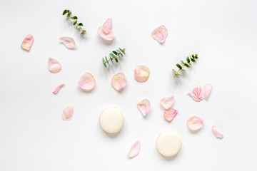 spring pattern with macaroons and flower in soft light top view