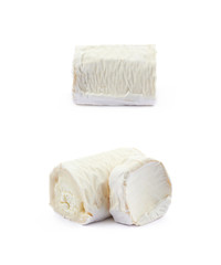 Stick of a goat cheese isolated