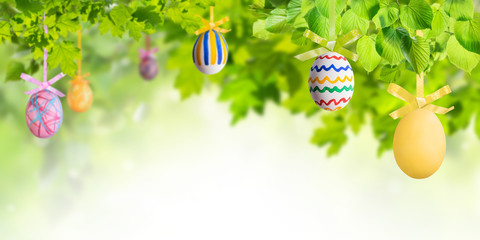 Easter Eggs in Green Branches - 138388220