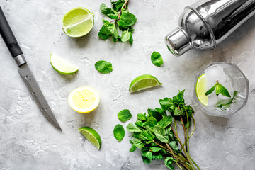 making mojito on stone background top view
