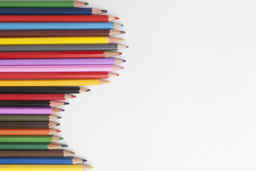 Fototapeta premium a wave of colored pencils