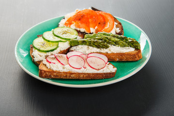 Four different sandwiches on the plate