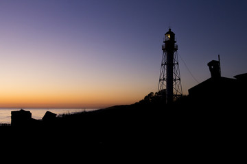 The Pape lighthouse in Latvia at sunset