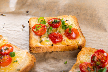 Grilled toast with camembert and cherry tomatoes