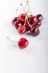 Naklejka na ściany i meble Heap of fresh wet cherries
