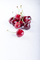 Fototapeta na wymiar Heap of fresh wet cherries