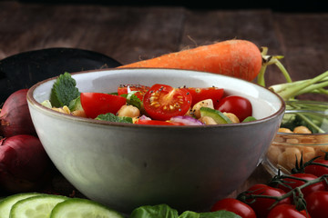 Healthy homemade chickpea and veggies salad, diet, vegetarian, vegan food, vitamin snack