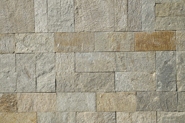 New stone wall closeup  in sun