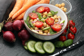Healthy homemade chickpea and veggies salad, diet, vegetarian, vegan food, vitamin snack