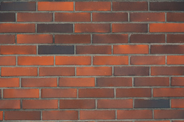 Obraz premium Текстура кирпичной стены, кирпич красного и чёрного оттенка 