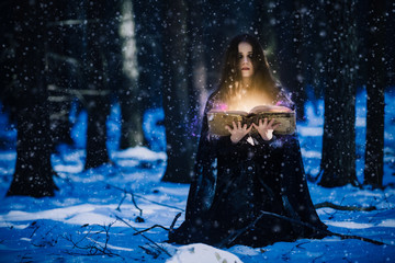 Sorceress celebrating the magic of the magic books