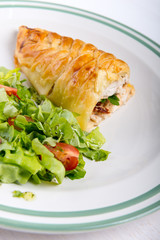 Chicken breast in french pastry with fresh salad
