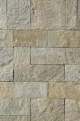 New stone wall closeup  in sun