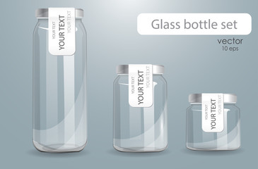 Set of transparent glass bottles.