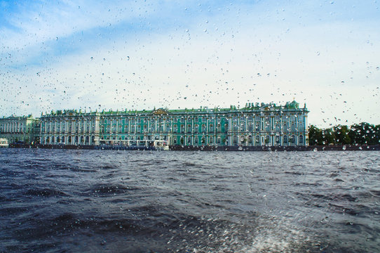 Drops of rain on glass, view from the boat on the Hermitage Museum St. Petersburg Russia